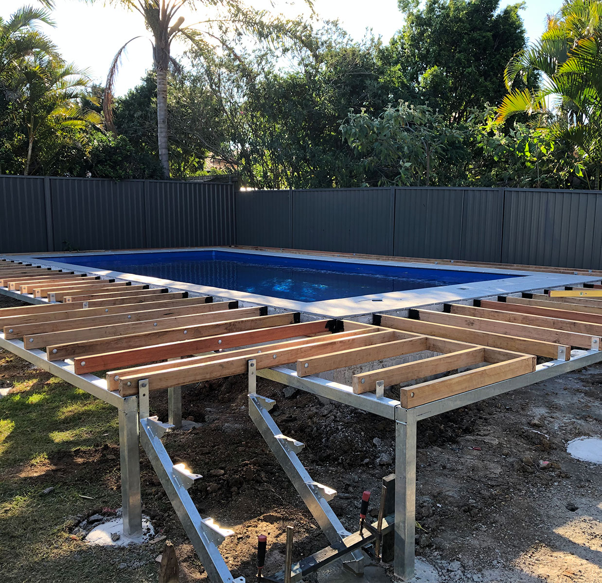 Pool decking construction